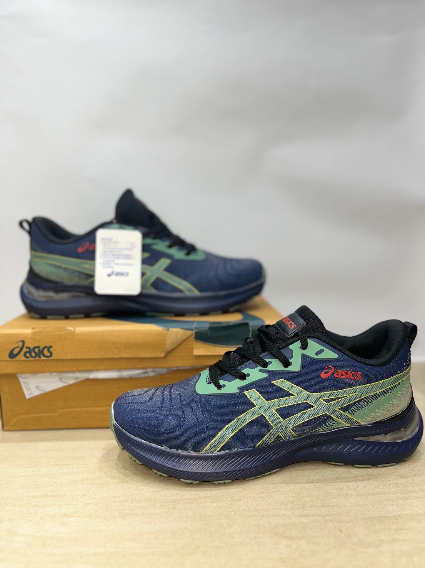 ASICS blue sports shoes