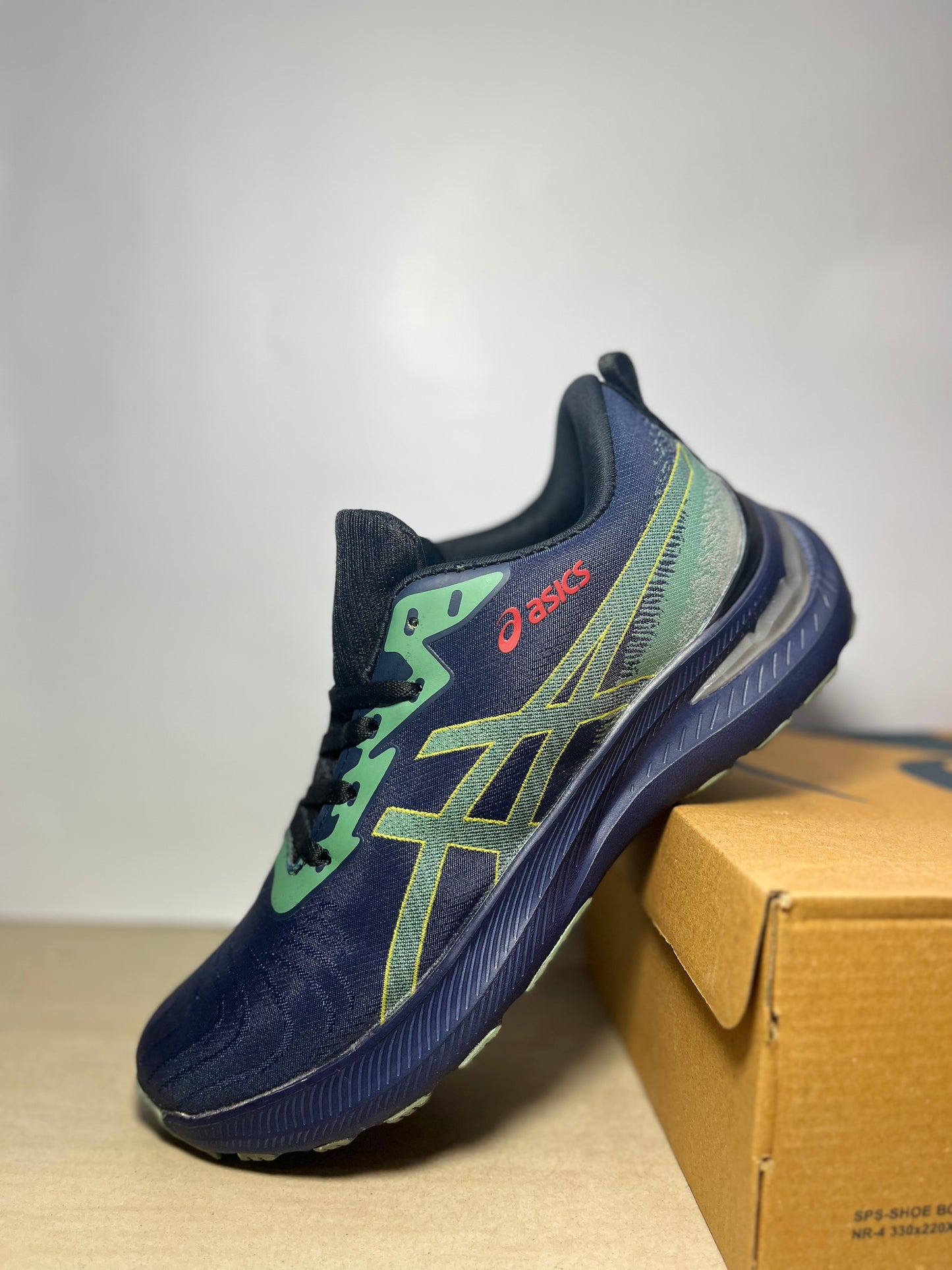 ASICS blue sports shoes